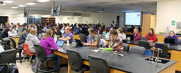students hear lectures in a microbiology lab