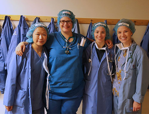 pedra a pedra four vet students in scrubs