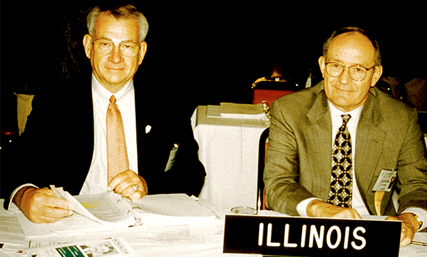 Dr. Hull poses with a photo with a colleague.