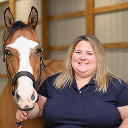 Sarah Gray with brown and white horse