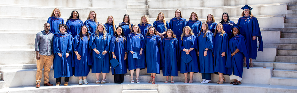 MVS graduates on the steps outside the Krannert Center for Performing Arts at the 2025 Commencement ceremony