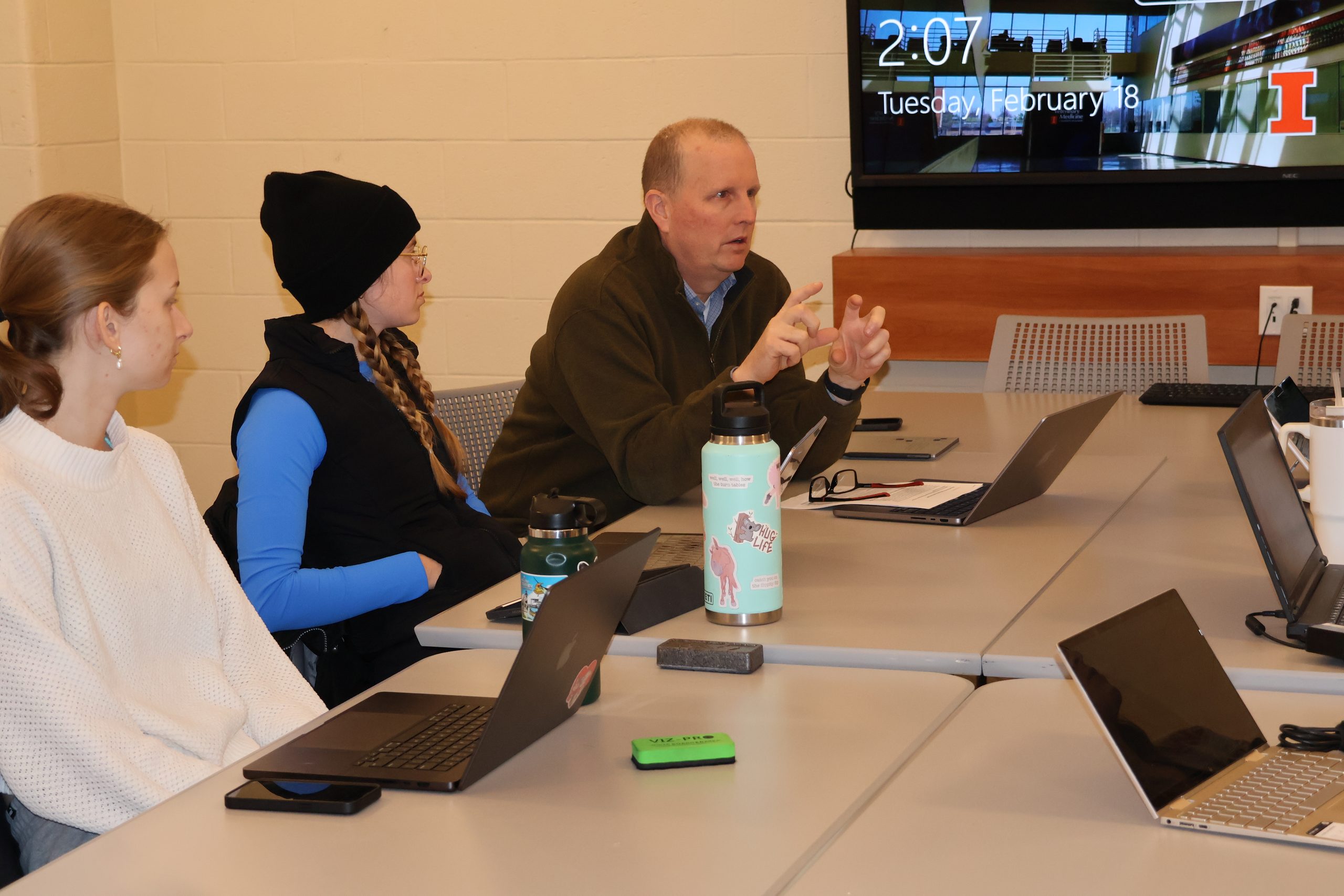 Dr. Lowe discuss projects with students.