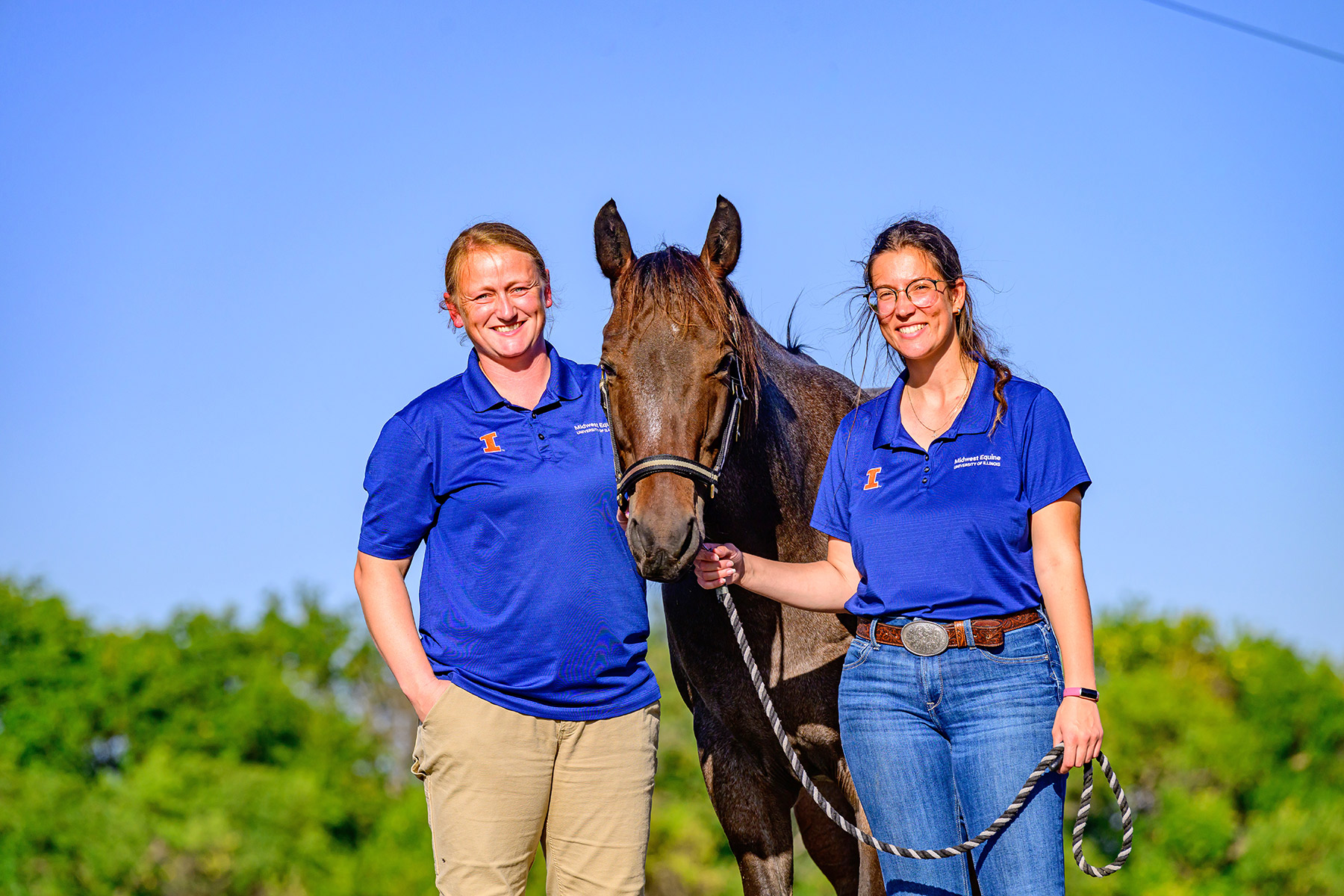Dr. Catherine "Cat" Foreman-Hesterberg and Kristina Slaby with a brown horse
