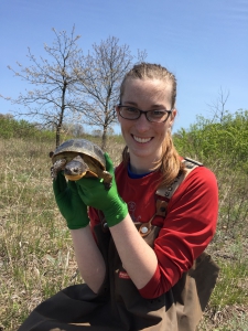 Erin poses with a Blanding's turtle