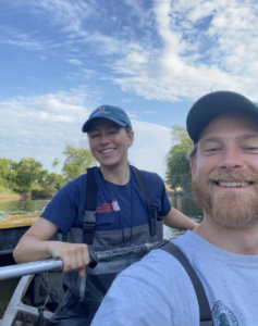 John and Kami take a selfie as they paddle down the river