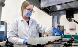 Dr. Robin Holland in the COVID lab