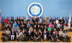 [Illinois veterinarians delivered training to more than 100 canine handlers with the Illinois State Police]