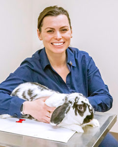 [Dr. Krista Keller with a rabbit]