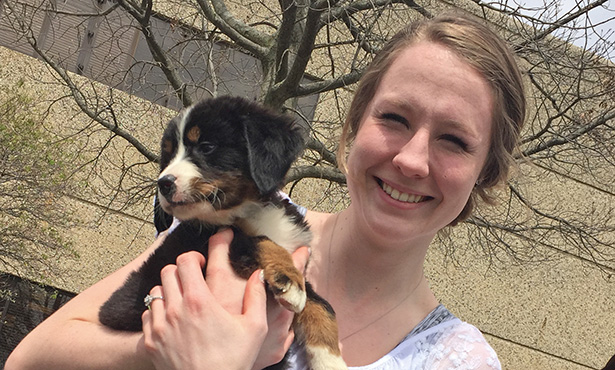 [Dr. Brittany Kleszynski holding a puppy]