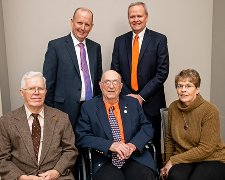 [K.T. Wright, center, at Dec. 5, 2019, celebration]