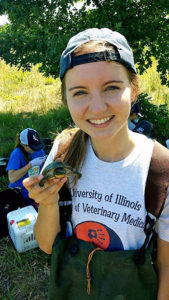 [Marta Rzadkowska with a turtle]