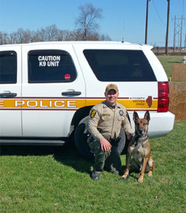 [working dog Arko and Officer Van Hoveln]