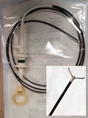 [endoscopy tube and inset closeup of grabber]