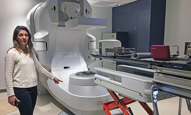 Dr. Kimberly Selting with Varian TrueBeam® linear accelerator.