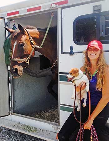 [Dr. Kristen Stowell with her dog Oli]