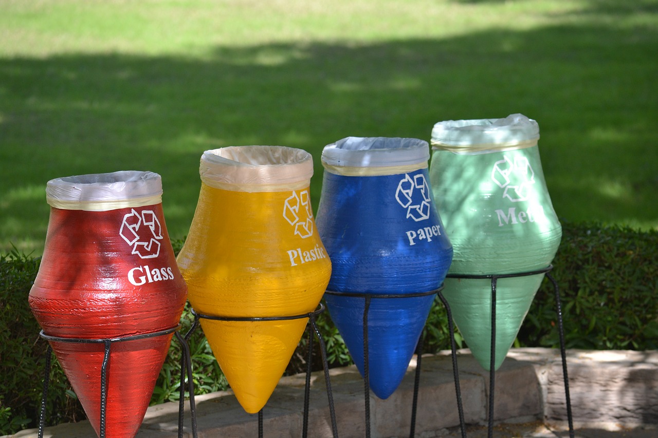 recycling containers for glass, plastic, paper, and metal