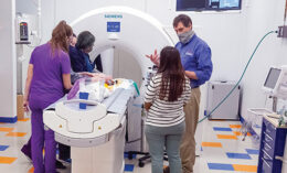 Dr. Kenneth Welle directs the imaging of one of his patients in the 128-slice