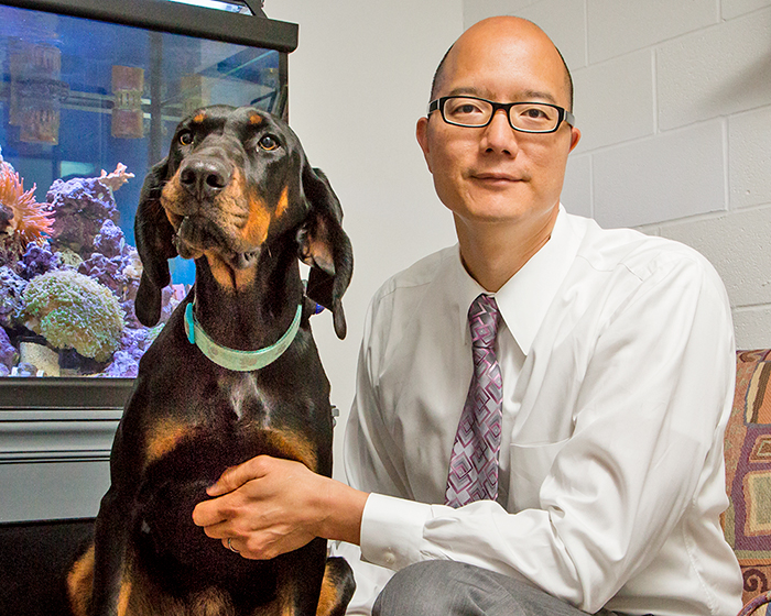 Dr. Tim Fan with his dog Ember