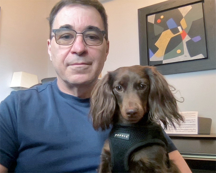 Dr. Howard L. Kaufman with his dog Moxie