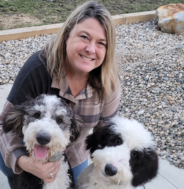 Dardi Miller with dogs, Bella and Daisy Mae