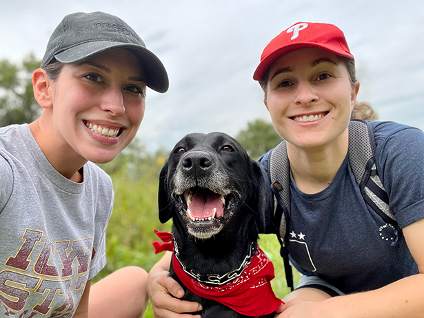 Krystal Newberry (left) with dog, Jodie (center), and wife, Dr. Hadley Gleason (right).