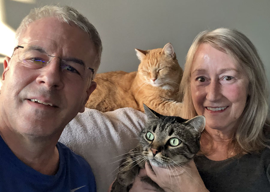 Dave and Laurie Sharar with their rescue cats