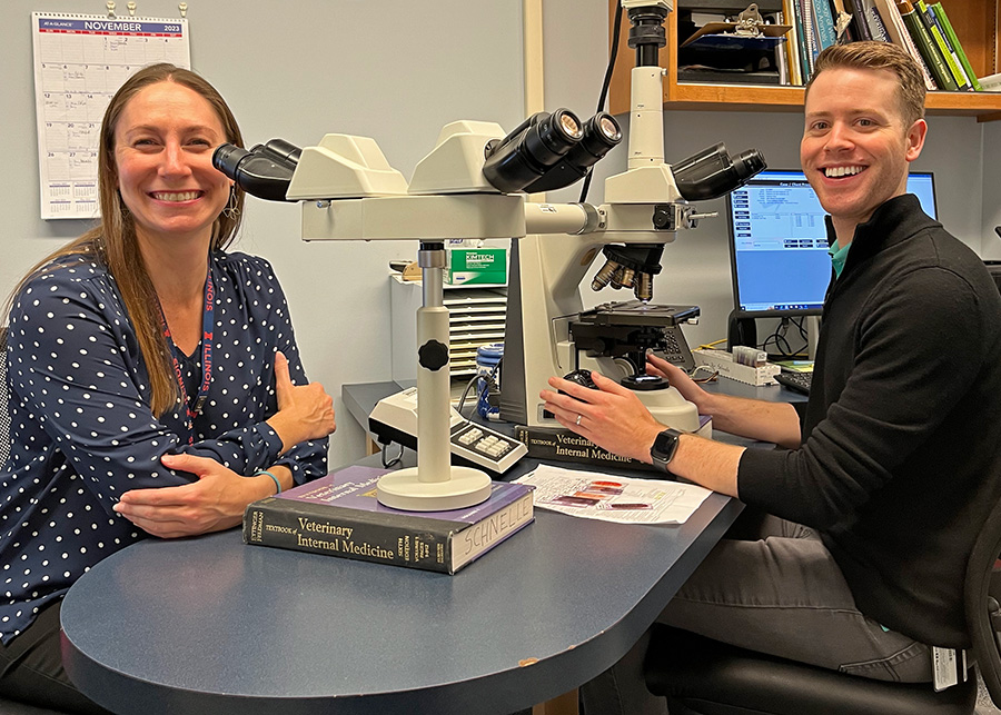 Dr. Sara Connolly and Dr. Nick Noto in the clinical pathology lab