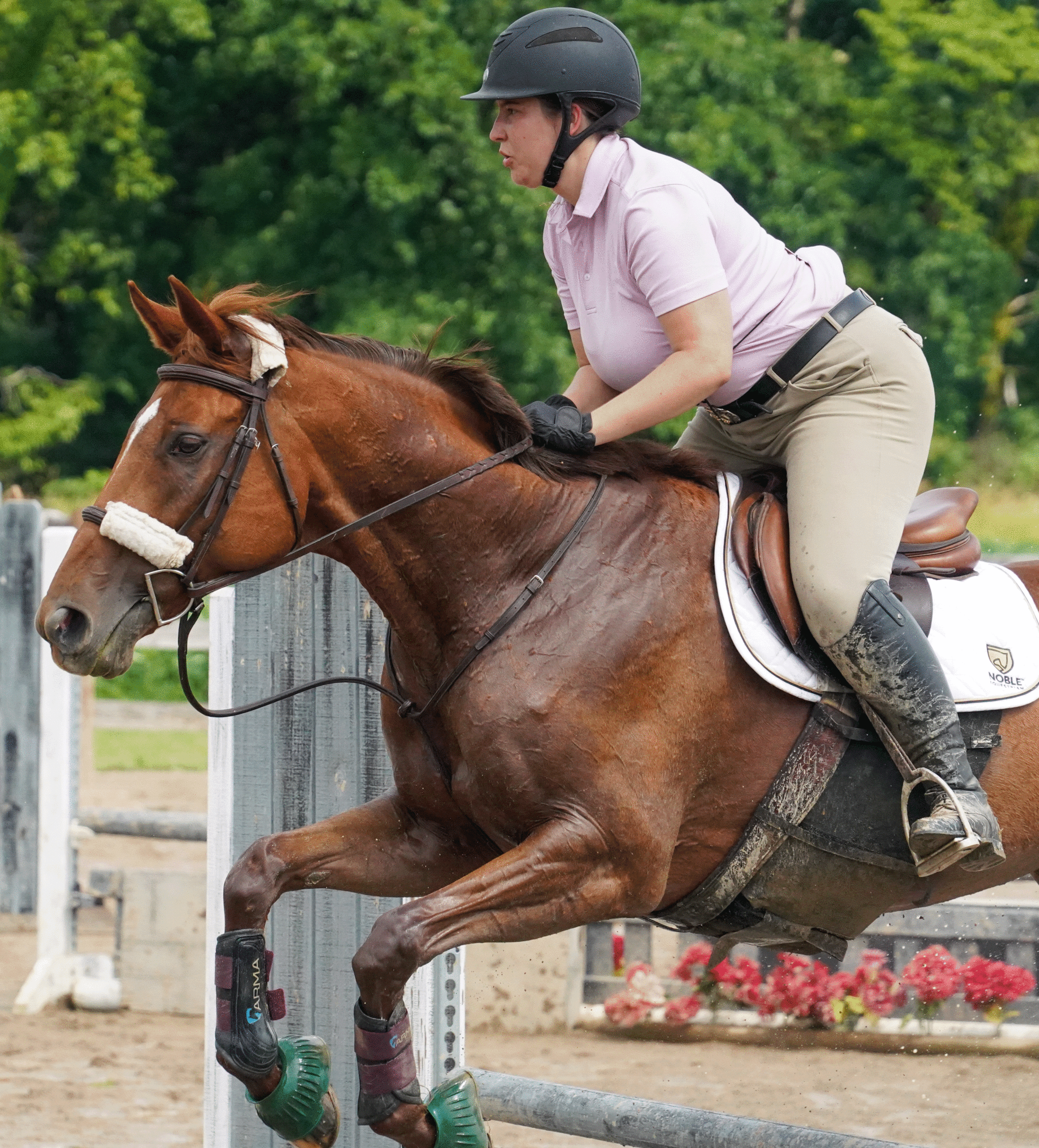 Kristina Slaby riding her thoroughbred mare, Nina.