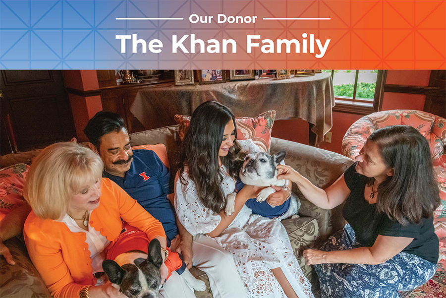 Our Donors: Ann and Shahid Khan holding dog Louie, Shanna holding dog Shanelle, with Dr. Laura Garrett 