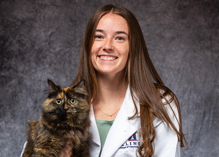 Vet student Annie Marlowe participated in a club fundraiser, offering professional portraits of students and their pets.