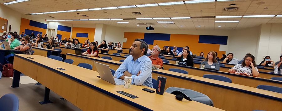 Rohit Bhargava and others listen to a speaker at the Midwest Association of Vetepray Pathology meeting