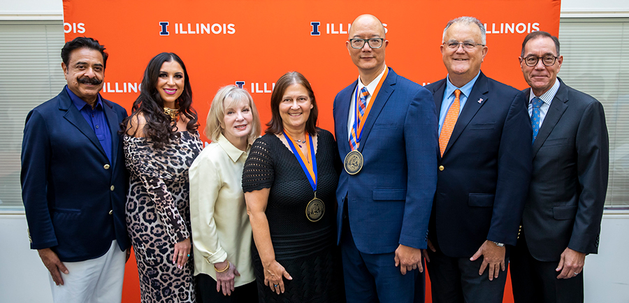 Kahn family poses with Drs. Laura Garrett and Tim Fan, Dean Constable, Provost.