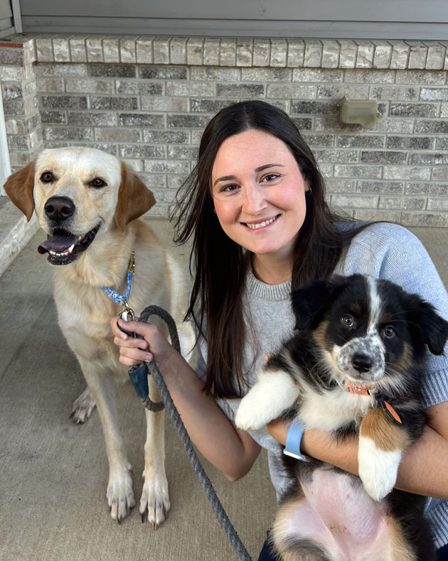 Elyse with her two dogs 