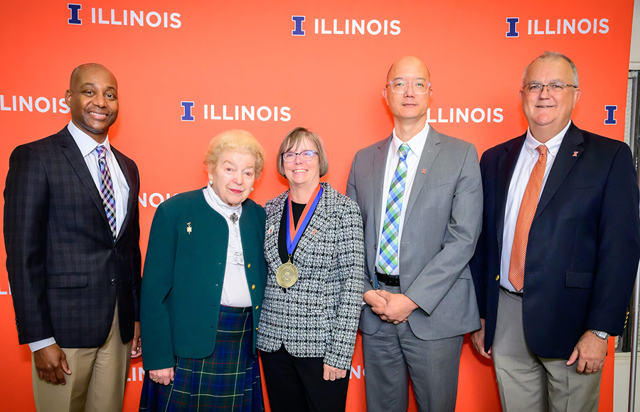 Vice Provost for Undergraduate Education Kevin Jackson, Dr. Edith Elisabeth Flynn, Dr. Tim Fan, and Dean Peter Constable post with Dr. Anne Barger during the investiture.