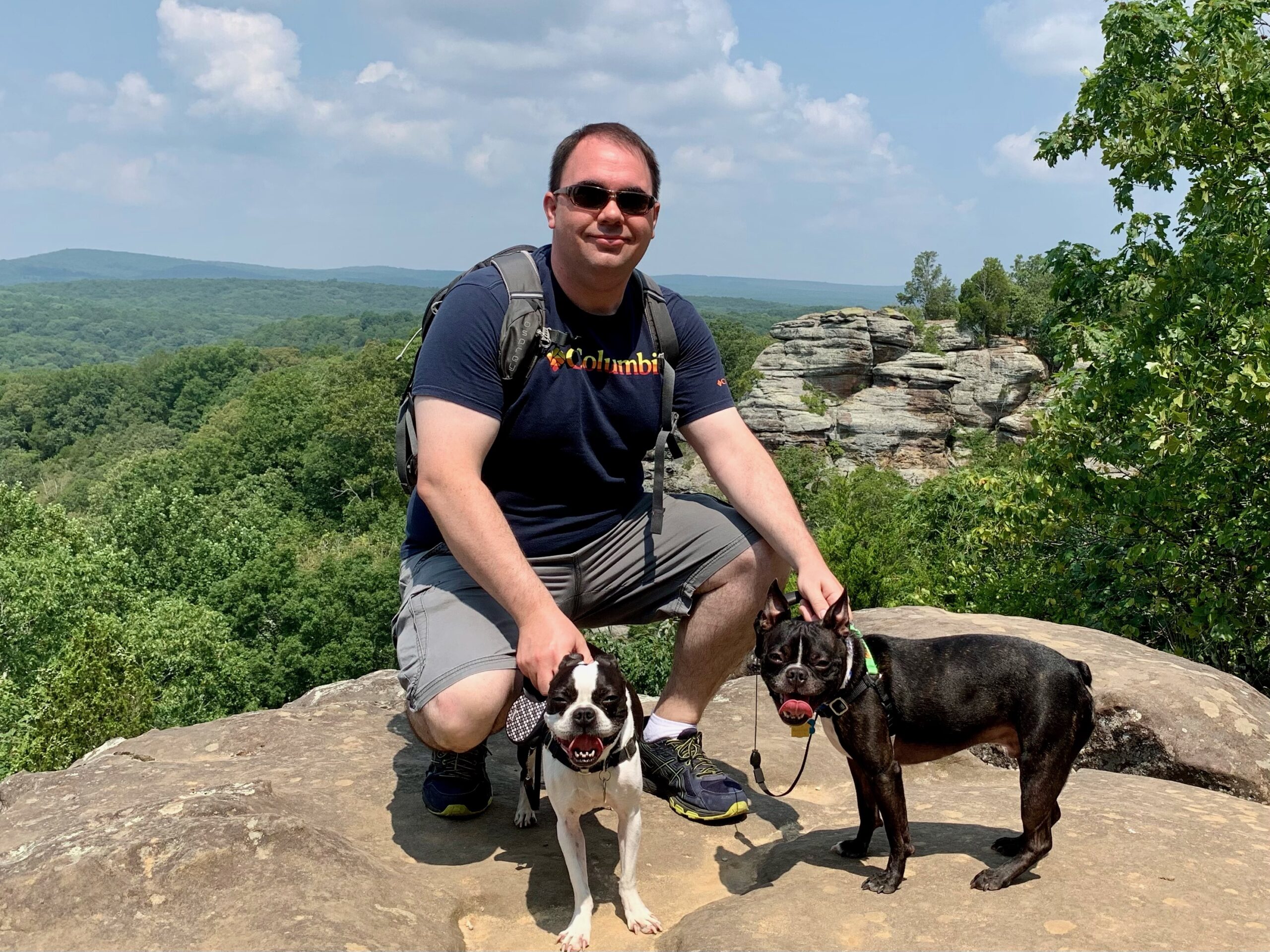 Christopher Gaulke hiking with two of his Boston terriers.