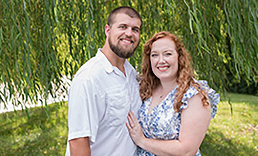 A couple posing for a photo.