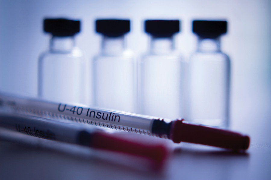 Insulin and syringe