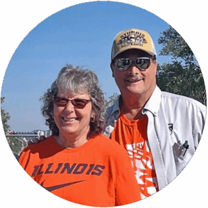Debbie Heinrichs and Dr. Ray Heinrichs, both wearing sunglasses outside