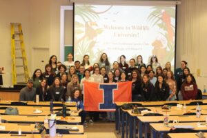 Non-Traditional Species Club Group in front of the Wildlife University Welcome screen.