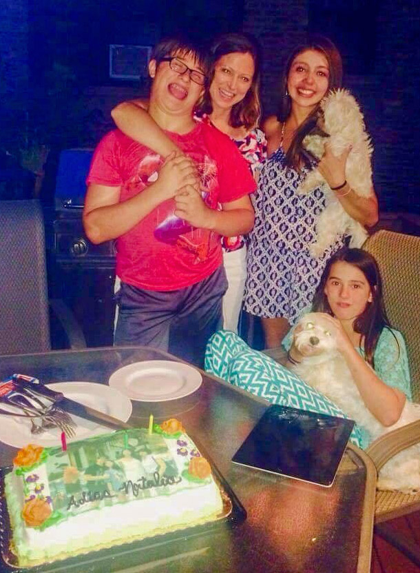 Charlie, the dog's, family at a celebration party