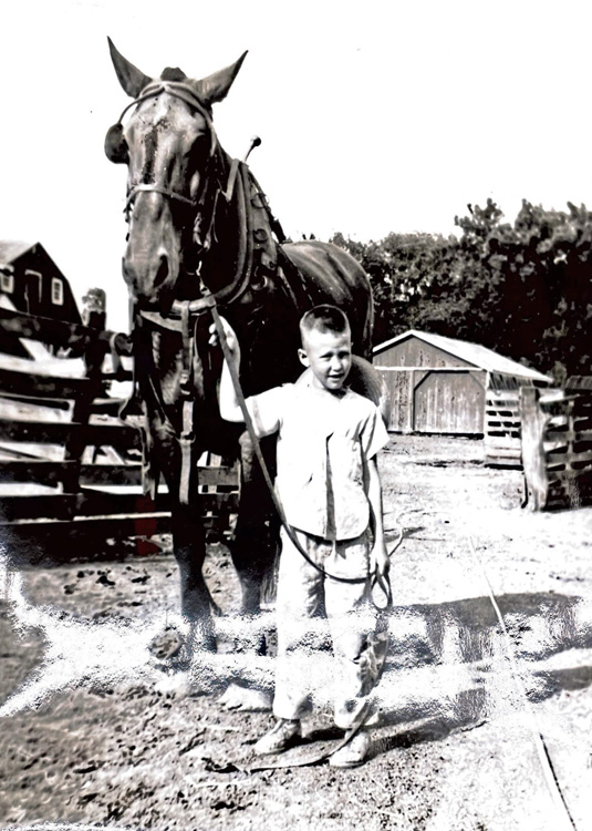 Young Dr. Roffey with a horse