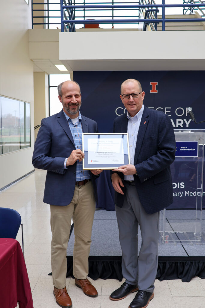 Will Sanders receiving a college excellence award