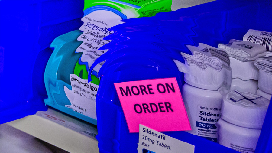 pharmacy shelf that says "more on order"